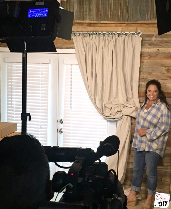 Outdoor DIY Curtains are all the rage! These cheap and easy no sew drop cloth curtains with an industrial look make them the perfect project for your outdoor decor!